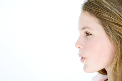 Teenage girl standing with mouth open